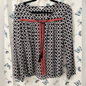 Crown & Ivy Black and White Geometric Blouse with Red Accents